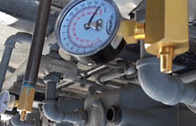 Commercial plumber performing gas test on building in Central Los Angeles, CA